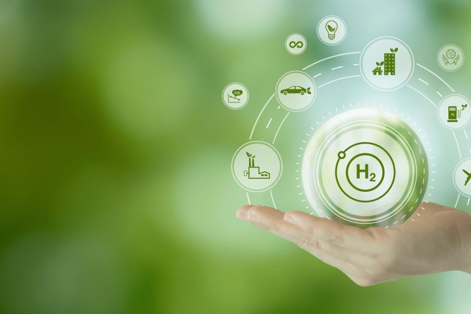 A hand holding a symbolic hydrogen molecule surrounded by various green energy icons, representing the potential of hydrogen in sustainable energy solutions, with a focus on 2024 Green Hydrogen Summit Insights.